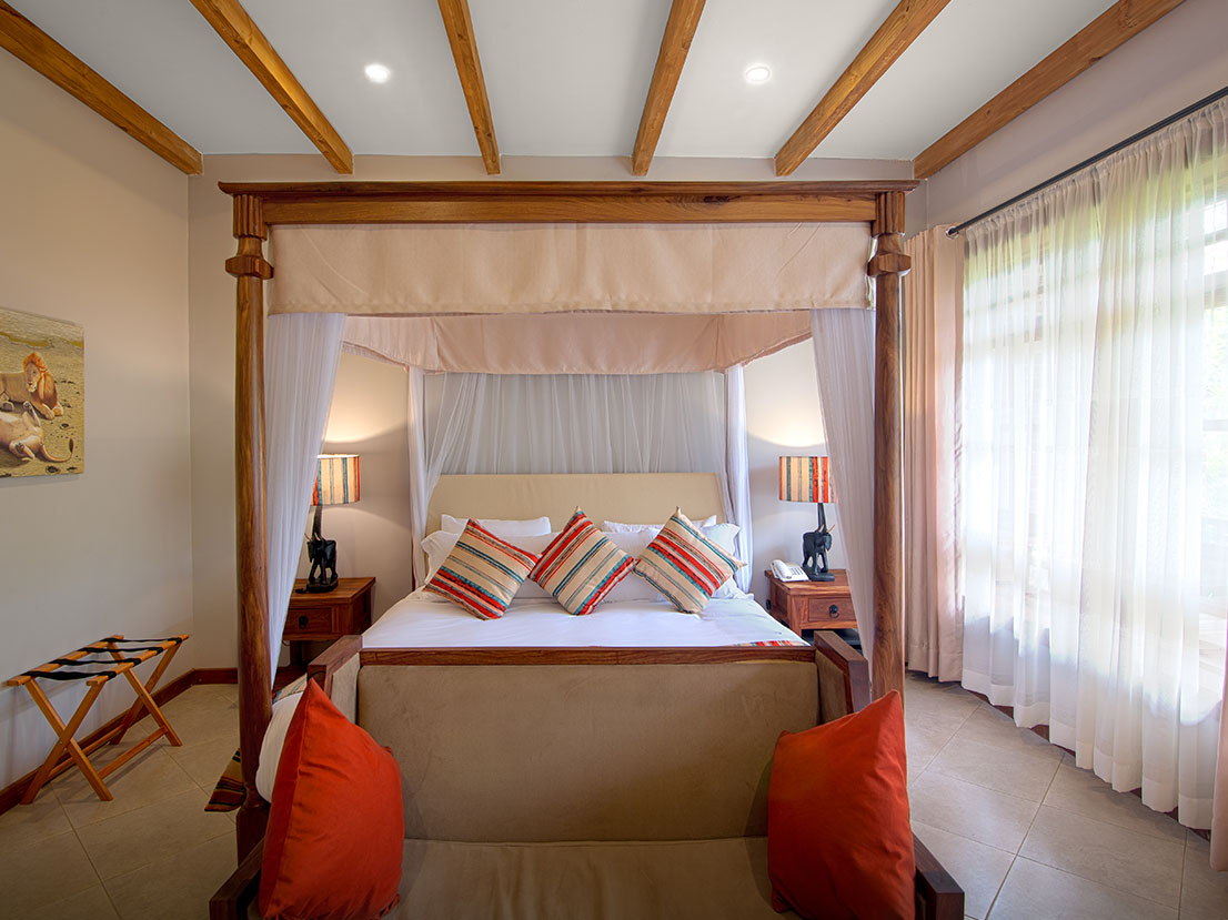 Airport-Planet_Lodge_Exec-Suite-Bedroom-TANZANIA SAFARI